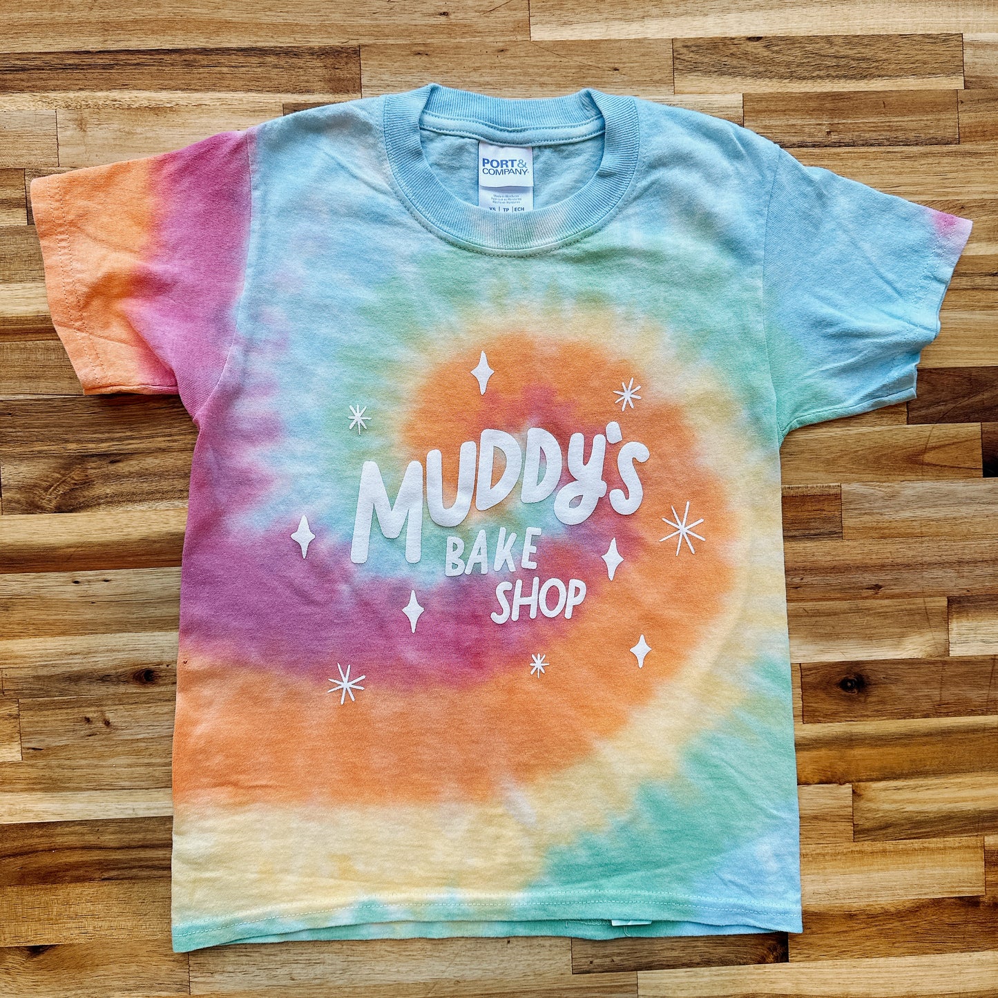 Muddy's Tee Shirt- retro logo on green